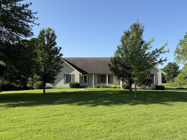 114 W Carman Rd, El Dorado Springs, MO 64744 - view of front of house with a front lawn