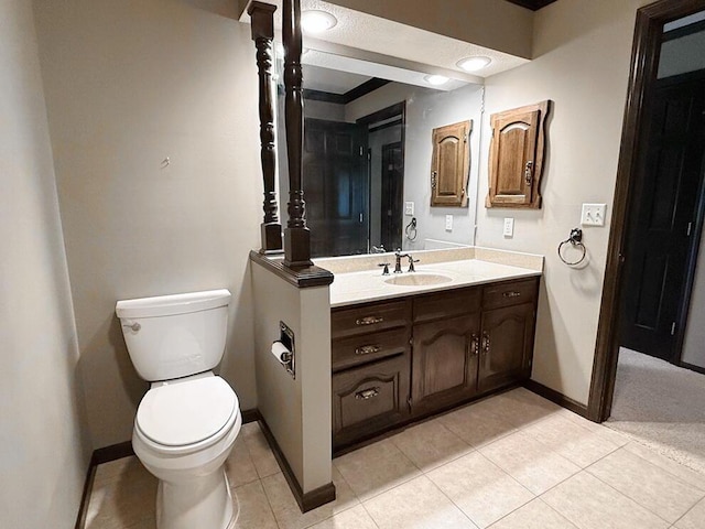 114 W Carman Rd, El Dorado Springs, MO 64744 - bathroom with vanity and tile patterned flooring