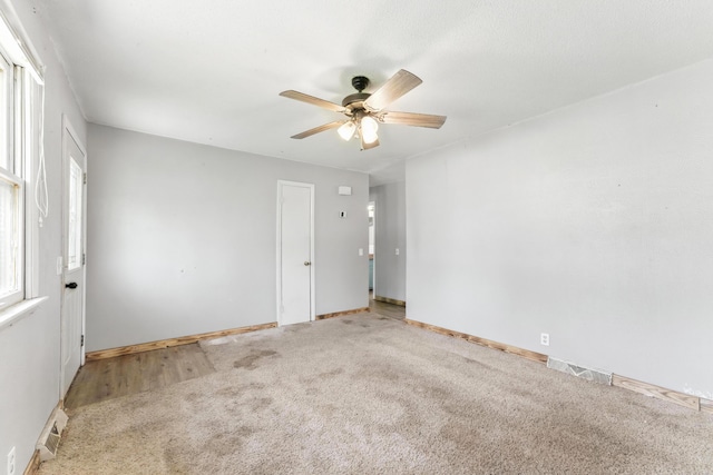 621 E Cleveland St, Seymour, MO 65746 - empty room featuring a ceiling fan and carpet