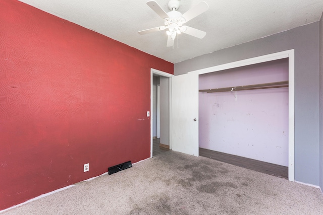 621 E Cleveland St, Seymour, MO 65746 - unfurnished bedroom featuring carpet floors, a closet, and a ceiling fan