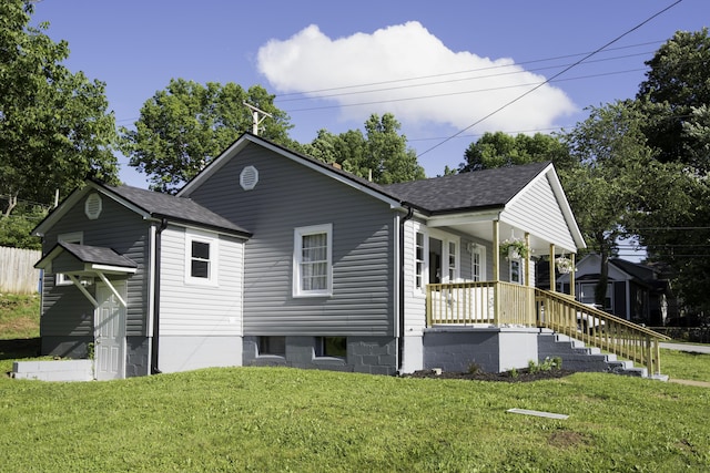 106 S 3rd Ave, Ozark, MO 65721 - view of front facade with a front yard, a porch, and roof with shingles