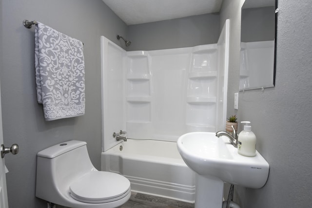 106 S 3rd Ave, Ozark, MO 65721 - bathroom featuring tub / shower combination and wood finished floors