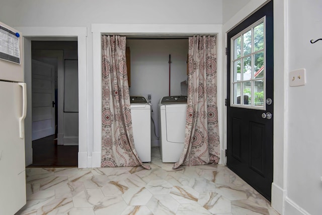 1510 E Mcdaniel St, Springfield, MO 65802 - laundry area with washing machine and dryer and marble finish flooring