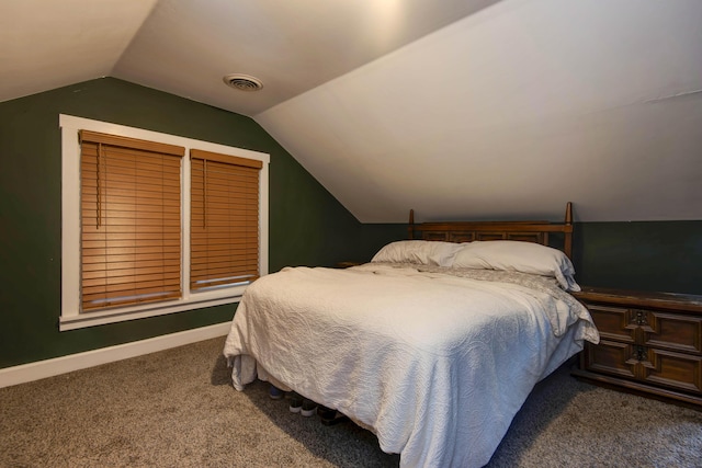 1510 E Mcdaniel St, Springfield, MO 65802 - carpeted bedroom featuring lofted ceiling and baseboards