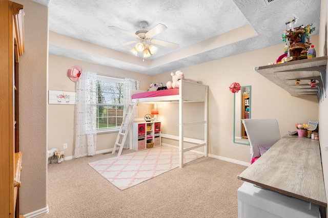 5476 Anita Ave, Pleasant Hope, MO 65725 - bedroom with carpet flooring, a tray ceiling, a textured ceiling, and a ceiling fan