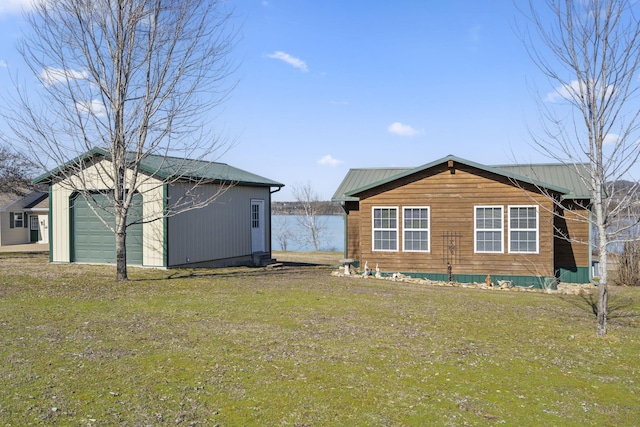 LOT19 Edwards Dr, Shell Knob, MO 65747 - rear view of property featuring an outbuilding, a yard, and a detached garage