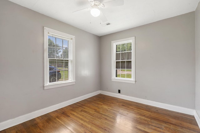 1524 S Thelma Ave, Springfield, MO 65807 - unfurnished room with plenty of natural light, wood finished floors, and a ceiling fan