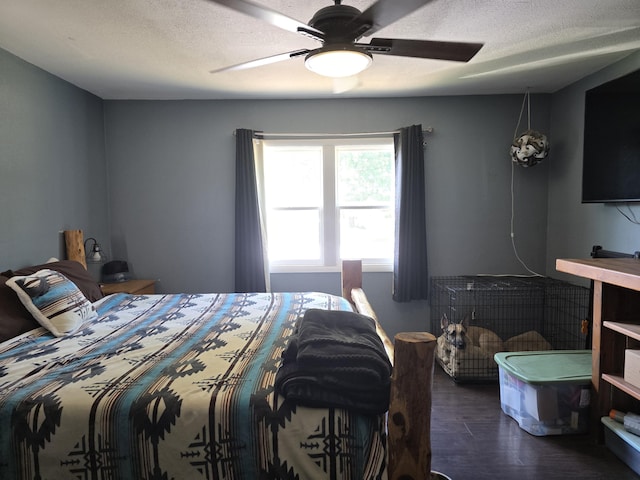 206 Ada St, Greenfield, MO 65661 - bedroom featuring wood finished floors, a ceiling fan, and a textured ceiling