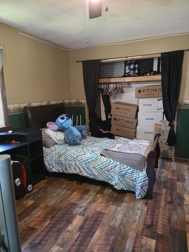 206 Ada St, Greenfield, MO 65661 - bedroom featuring wood finished floors, a textured ceiling, ceiling fan, and a closet