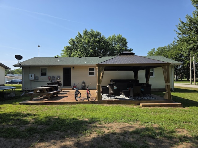 206 Ada St, Greenfield, MO 65661 - rear view of house featuring a gazebo, a lawn, and a patio area
