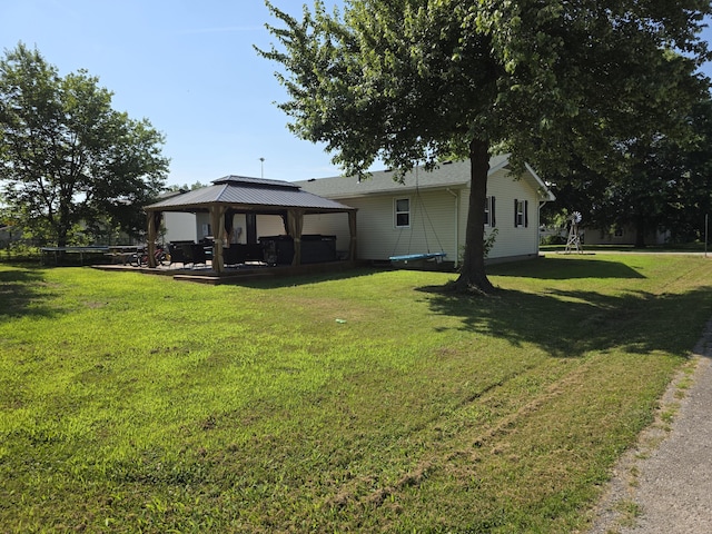 206 Ada St, Greenfield, MO 65661 - rear view of house with a gazebo and a yard