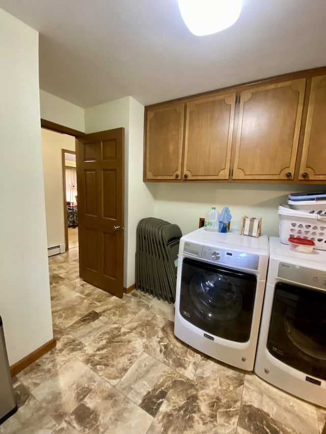 1605 S Park Ave, Aurora, MO 65605 - laundry area with cabinet space, a baseboard heating unit, and washing machine and clothes dryer