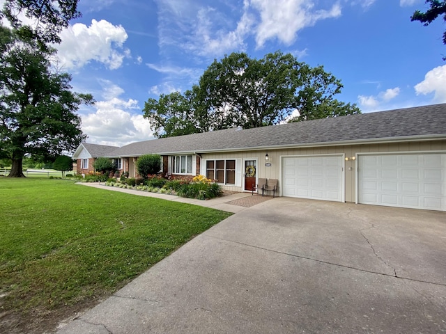 1605 S Park Ave, Aurora, MO 65605 - ranch-style home featuring an attached garage, concrete driveway, and a front lawn