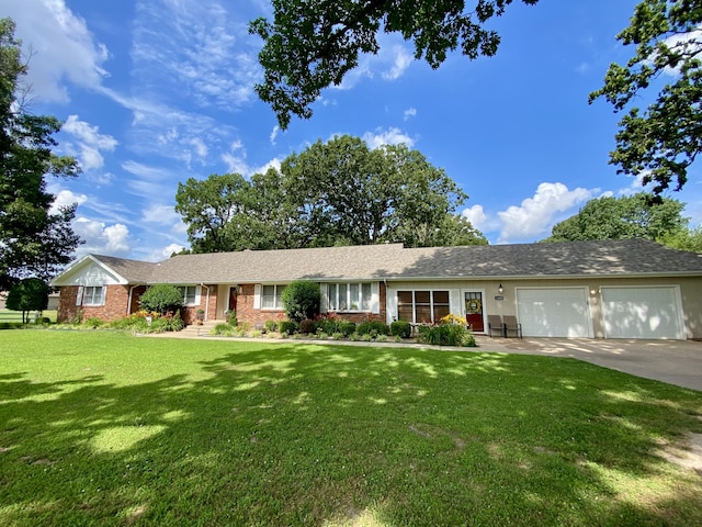 1605 S Park Ave, Aurora, MO 65605 - single story home featuring an attached garage, brick siding, concrete driveway, and a front yard