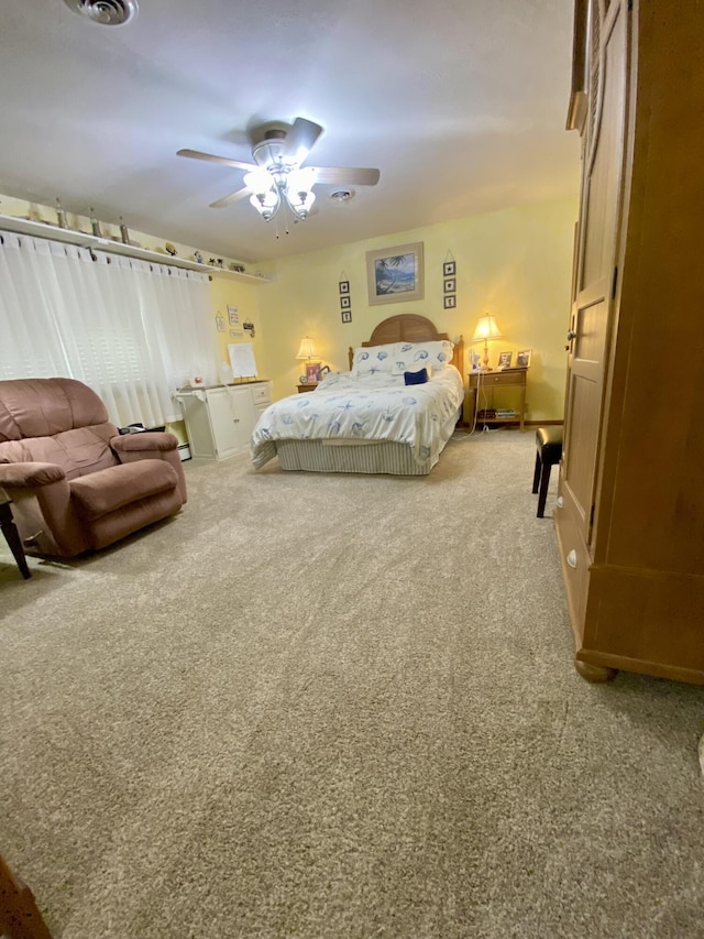 1605 S Park Ave, Aurora, MO 65605 - carpeted bedroom with ceiling fan