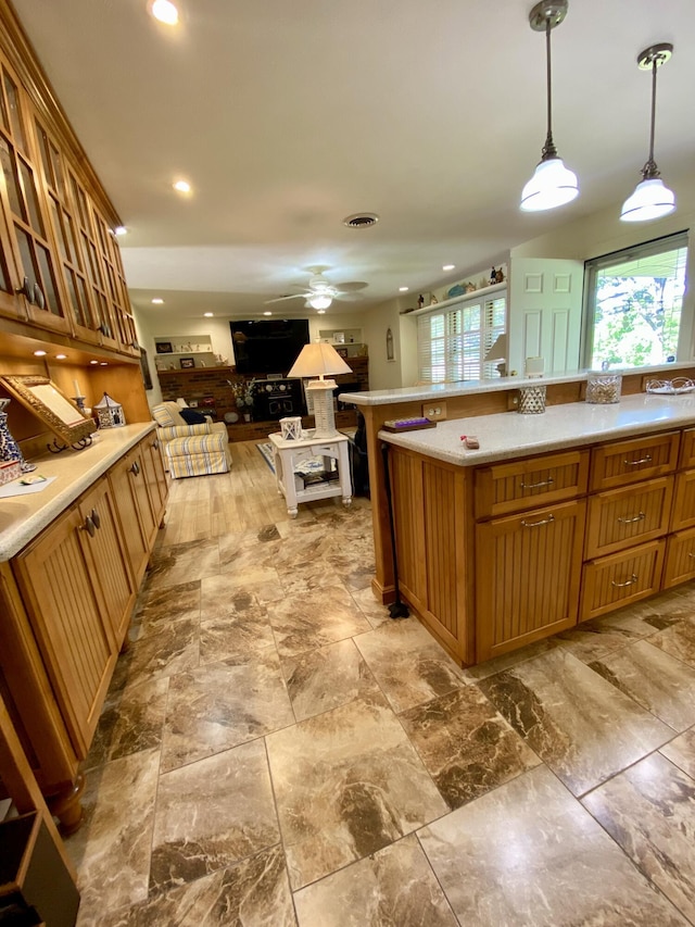 1605 S Park Ave, Aurora, MO 65605 - kitchen featuring healthy amount of natural light, light countertops, pendant lighting, and recessed lighting