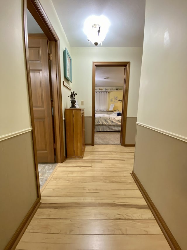 1605 S Park Ave, Aurora, MO 65605 - hallway with light wood finished floors