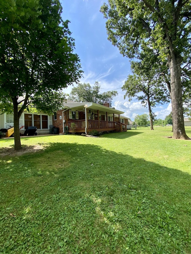 1605 S Park Ave, Aurora, MO 65605 - view of grassy yard with covered porch