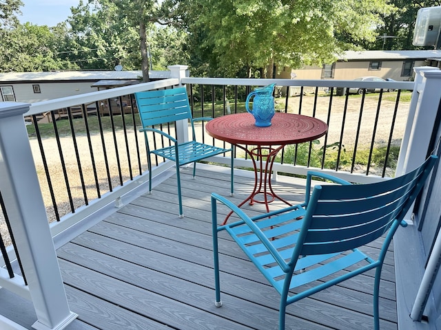 25795 Canyon Dr, Hermitage, MO 65668 - wooden deck with view of scattered trees