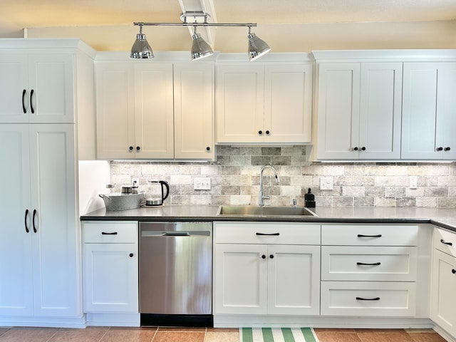 25795 Canyon Dr, Hermitage, MO 65668 - kitchen featuring dishwasher, white cabinets, dark countertops, and decorative backsplash
