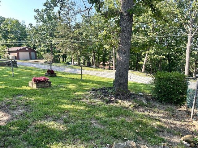 25795 Canyon Dr, Hermitage, MO 65668 - view of yard with a detached garage