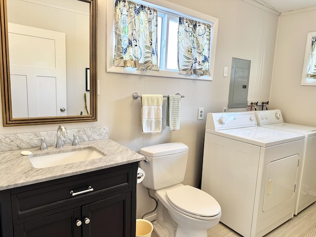 25795 Canyon Dr, Hermitage, MO 65668 - bathroom with electric panel, washing machine and clothes dryer, and vanity
