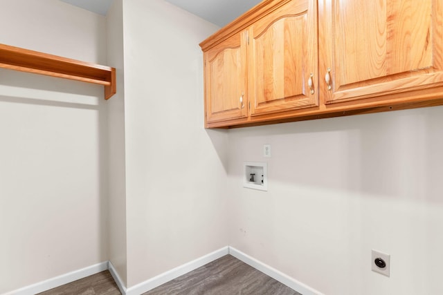 604 N Ellen St, Nixa, MO 65714 - laundry room featuring washer hookup, electric dryer hookup, cabinet space, and dark wood-type flooring