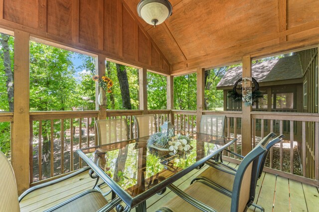 23 Olivia Ct Unit 103A, Branson West, MO 65737 - unfurnished sunroom featuring lofted ceiling and outdoor dining space