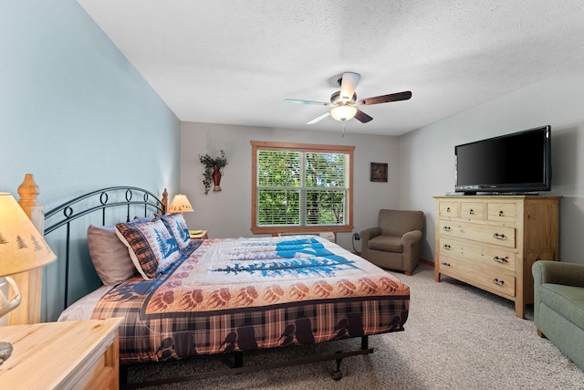 23 Olivia Ct Unit 103A, Branson West, MO 65737 - carpeted bedroom featuring ceiling fan and a textured ceiling