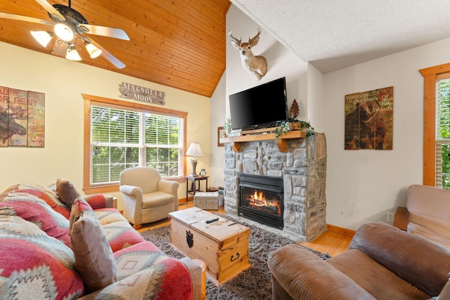 23 Olivia Ct Unit 103A, Branson West, MO 65737 - living area featuring wood finished floors, a fireplace, lofted ceiling, and a ceiling fan