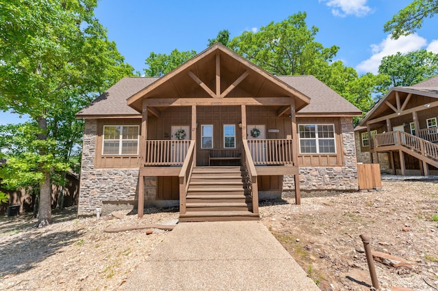 23 Olivia Ct Unit 103A, Branson West, MO 65737 - rustic home with stone siding, stairway, board and batten siding, and a shingled roof