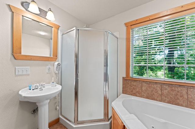 23 Olivia Ct Unit 103A, Branson West, MO 65737 - full bathroom with healthy amount of natural light, a shower stall, and a tub with jets