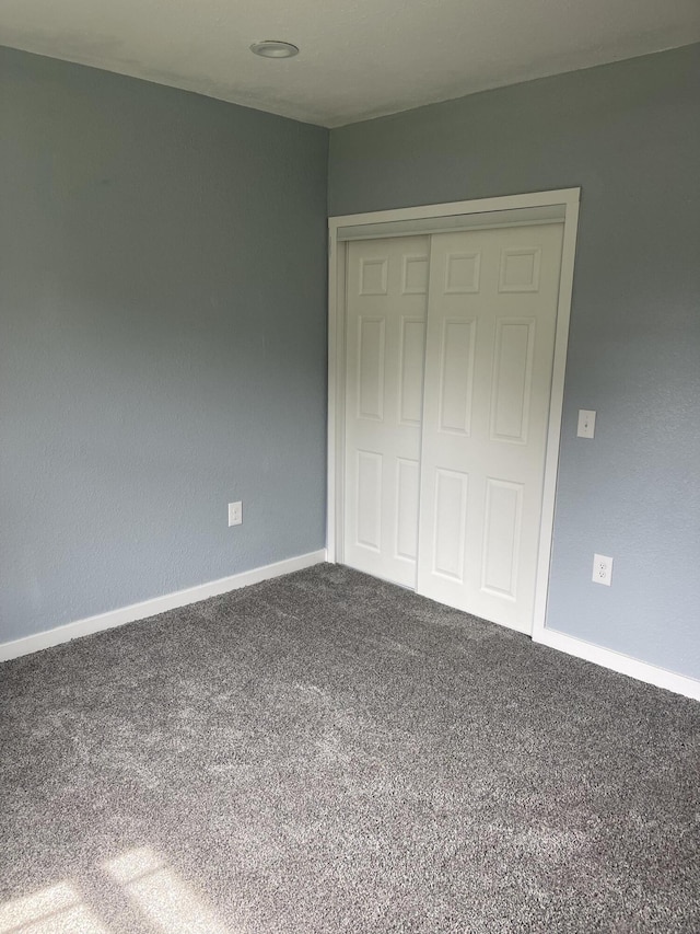 1506 6th St, Monett, MO 65708 - unfurnished bedroom featuring carpet and a closet