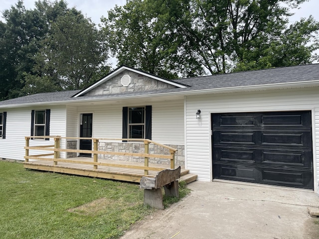 1506 6th St, Monett, MO 65708 - ranch-style home with a garage, stone siding, a front lawn, driveway, and roof with shingles