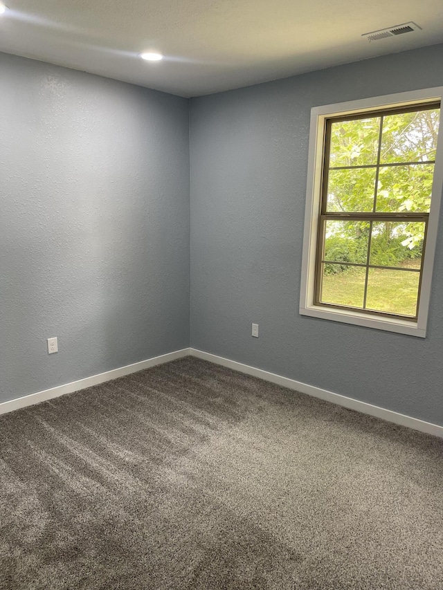 1506 6th St, Monett, MO 65708 - empty room with carpet and baseboards
