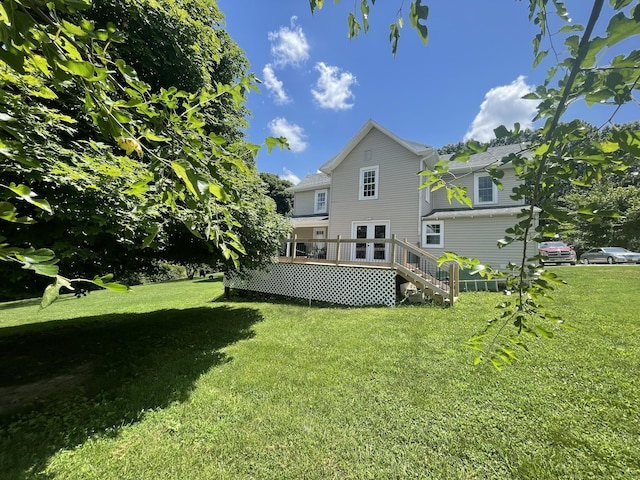 289 Backyard St, Crane, MO 65633 - rear view of property with a lawn and a deck