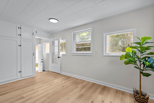 936 W Division St, Springfield, MO 65803 - unfurnished bedroom featuring light wood finished floors and baseboards