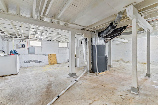 936 W Division St, Springfield, MO 65803 - below grade area with washer / clothes dryer, electric panel, and heating unit
