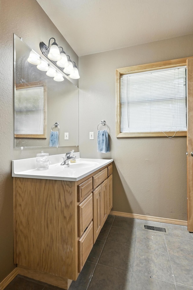 22562 Air Park Dr, Golden, MO 65658 - bathroom featuring vanity and baseboards