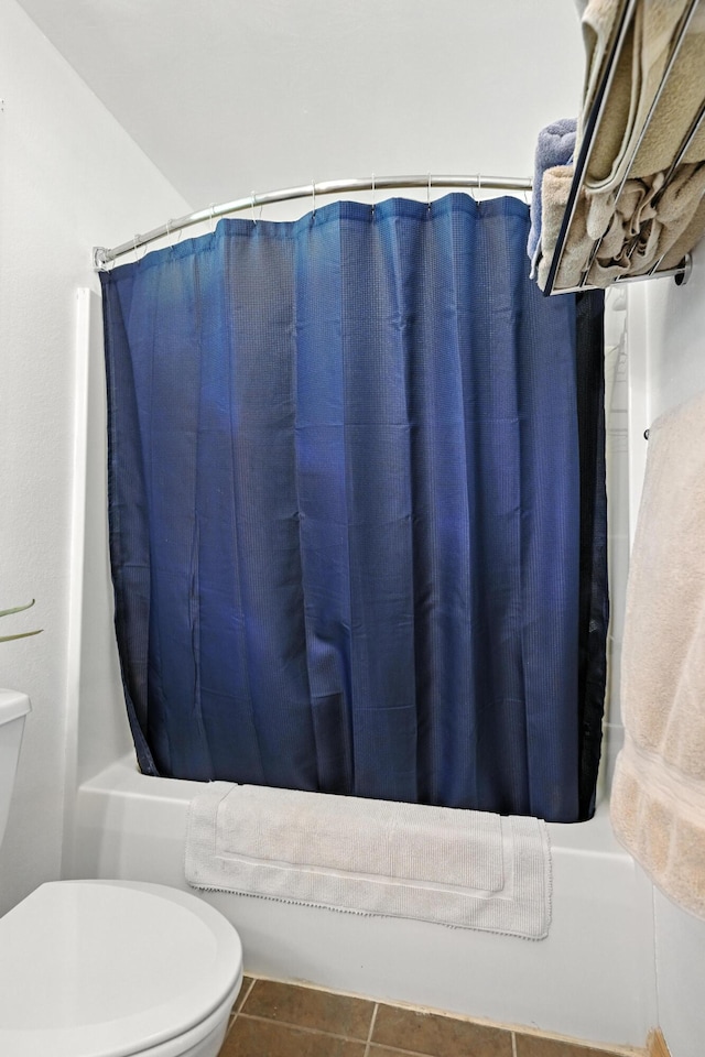22562 Air Park Dr, Golden, MO 65658 - bathroom featuring shower / bath combo with shower curtain and tile patterned floors