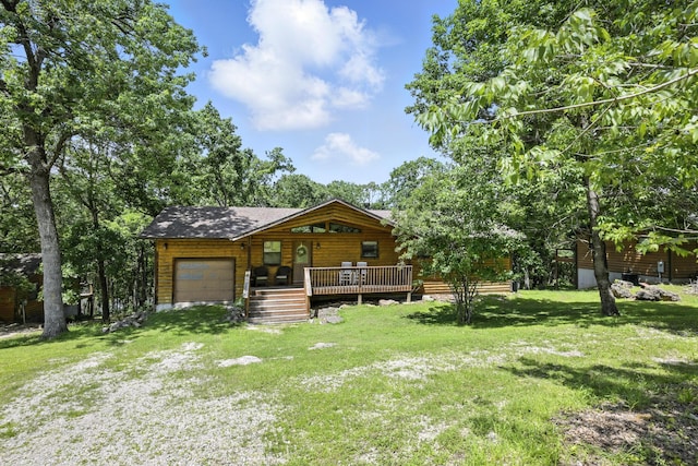 22562 Air Park Dr, Golden, MO 65658 - log-style house featuring an attached garage, a front lawn, covered porch, and driveway