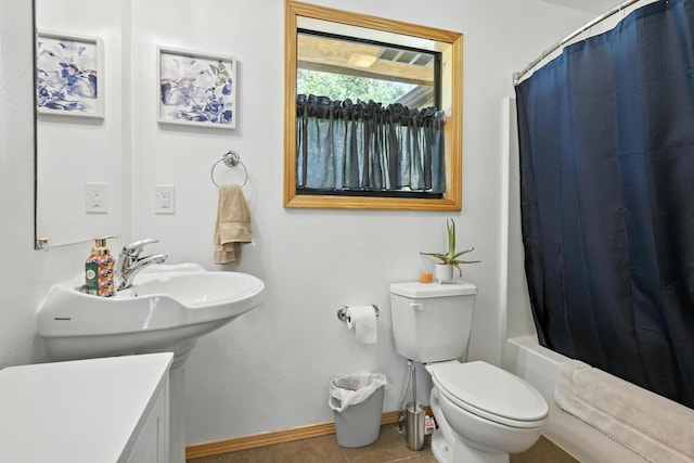 22562 Air Park Dr, Golden, MO 65658 - full bath featuring shower / bath combo with shower curtain and tile patterned floors