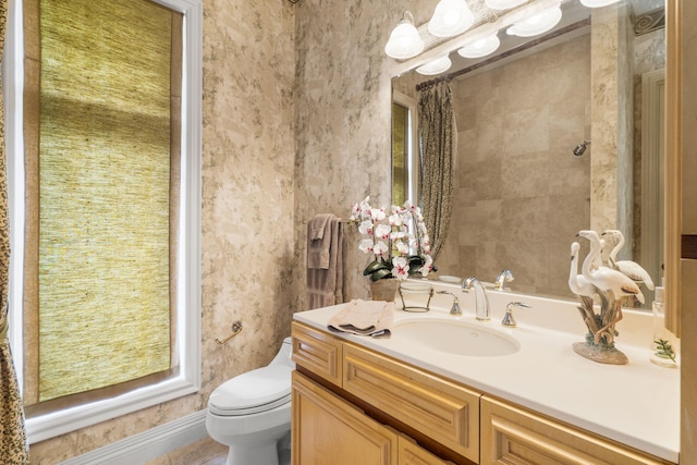 318 S Farm Rd Unit 193, Springfield, MO 65809 - bathroom with vanity and wallpapered walls