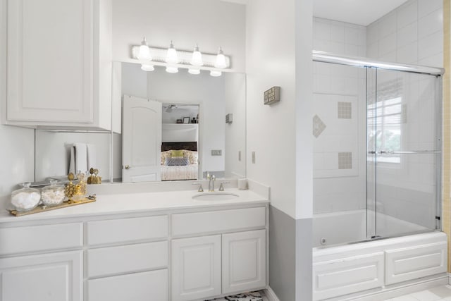 318 S Farm Rd Unit 193, Springfield, MO 65809 - ensuite bathroom featuring enclosed tub / shower combo and vanity