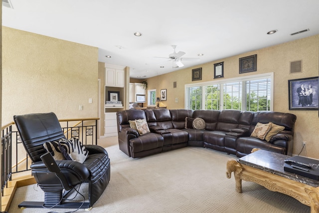 318 S Farm Rd Unit 193, Springfield, MO 65809 - living area with light colored carpet, a textured wall, a ceiling fan, and recessed lighting