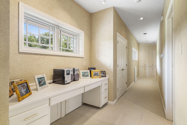 318 S Farm Rd Unit 193, Springfield, MO 65809 - hall with a desk, light colored carpet, and recessed lighting