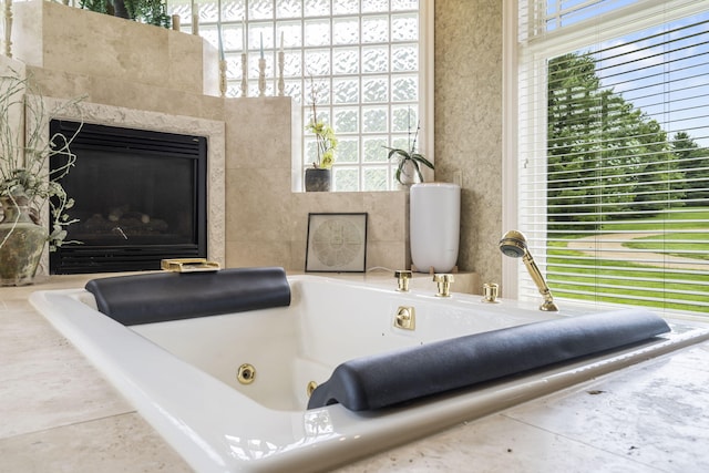 318 S Farm Rd Unit 193, Springfield, MO 65809 - detailed view of a whirlpool tub and a fireplace