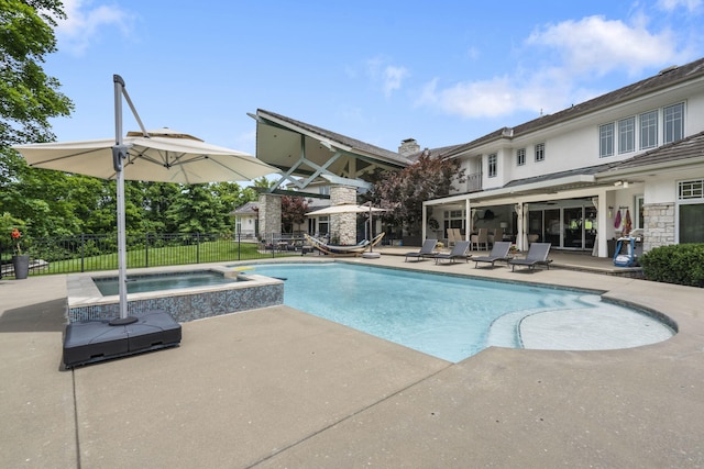 318 S Farm Rd Unit 193, Springfield, MO 65809 - view of swimming pool with a patio and a pool with connected hot tub