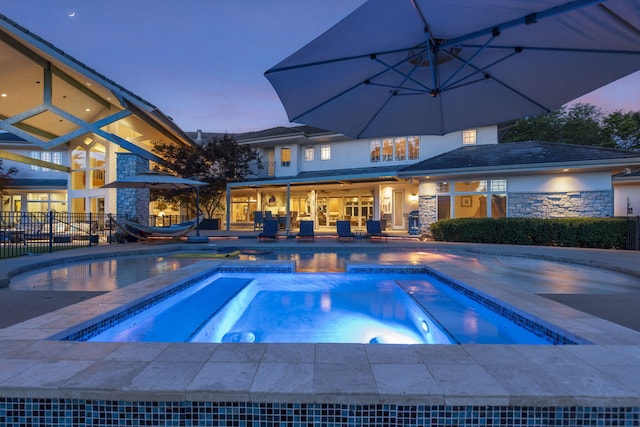 318 S Farm Rd Unit 193, Springfield, MO 65809 - swimming pool featuring an in-ground hot tub and a patio area