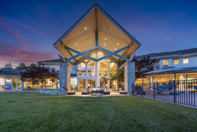 318 S Farm Rd Unit 193, Springfield, MO 65809 - back of property featuring a patio, stone siding, and a gazebo